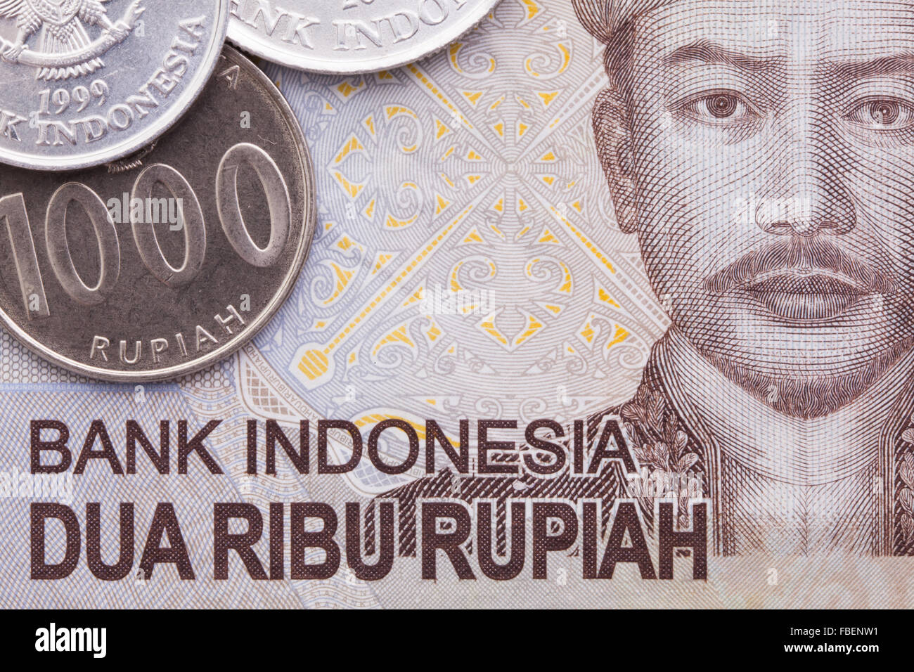 Indonesian money rupiah banknote and coins, close-up Stock Photo - Alamy