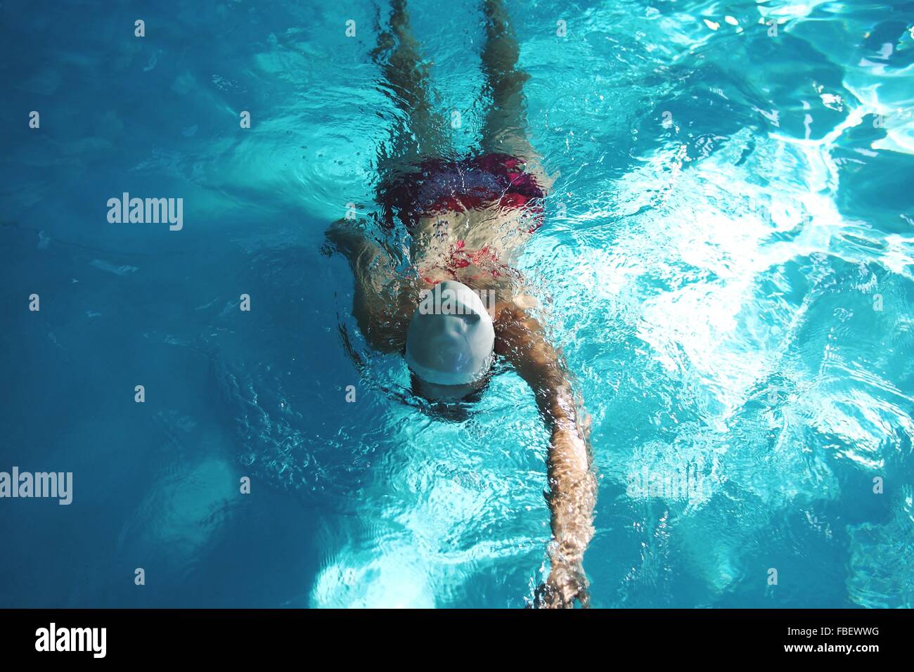 High Angle View Of Woman In Swimming Pool Stock Photo
