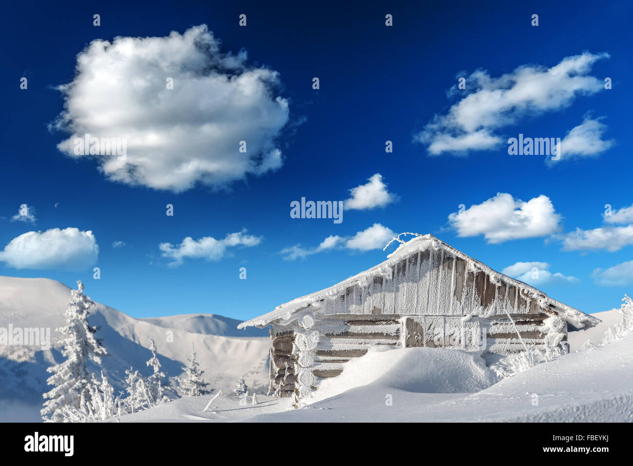 wooden house in winter forest Stock Photo - Alamy