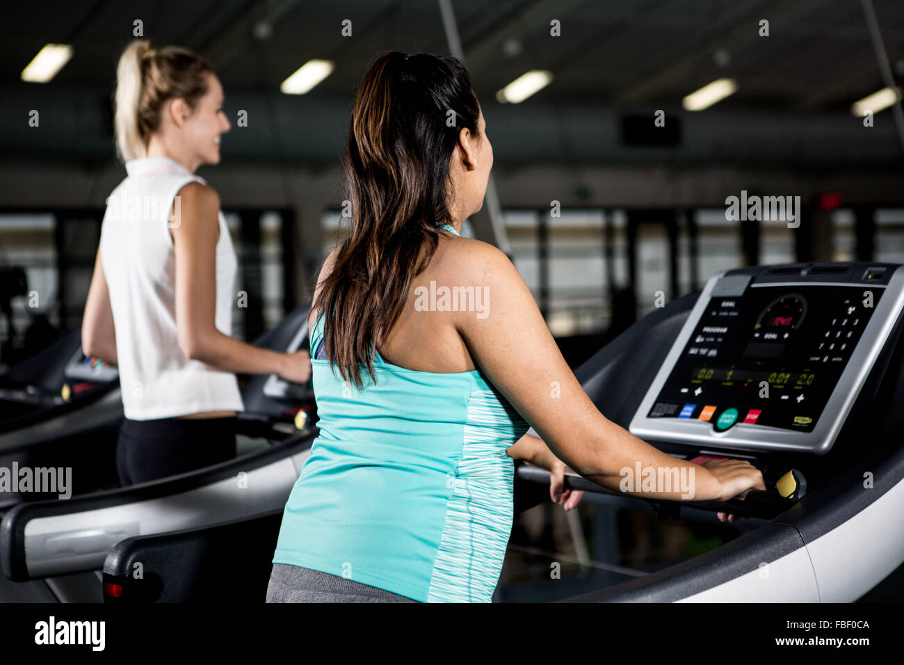 Pregnant woman on treadmill Stock Photo Alamy