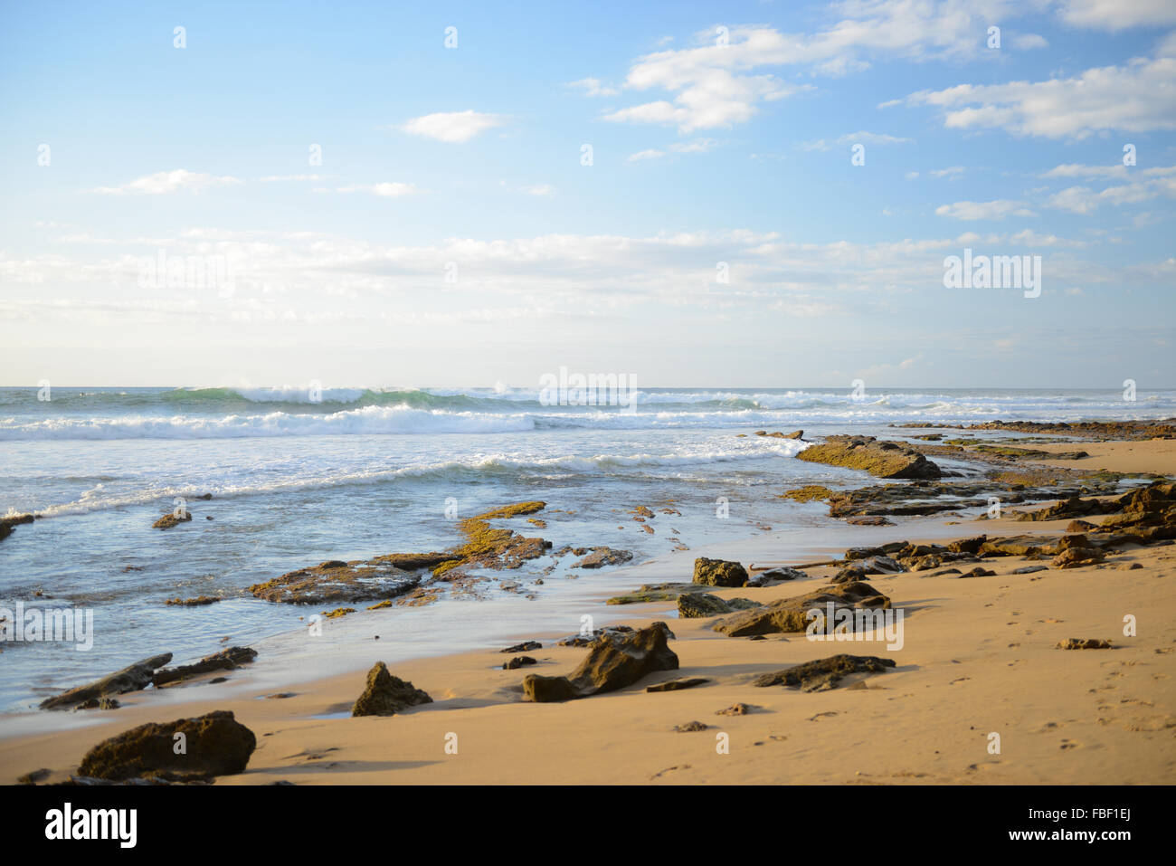 Sand and waves at the shore of Maria's Beach. Rincon, Puerto Rico. USA ...