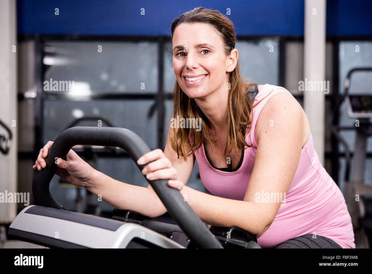 Pregnant woman riding bike Stock Photo Alamy