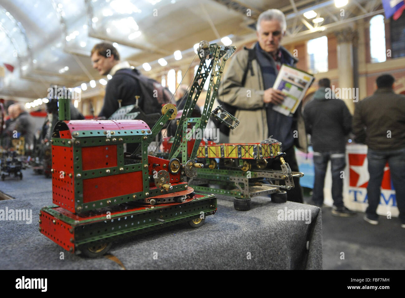 London, UK. 15th Jan, 2016. Men looking at a Meccano models on display at the London Model Engineering Exhibition which opened today at Alexandra Palace, London. Credit:  Michael Preston/Alamy Live News Stock Photo