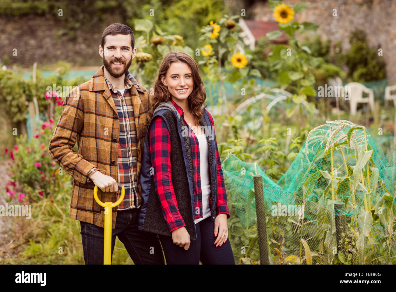 Couple in a garden hi-res stock photography and images - Alamy