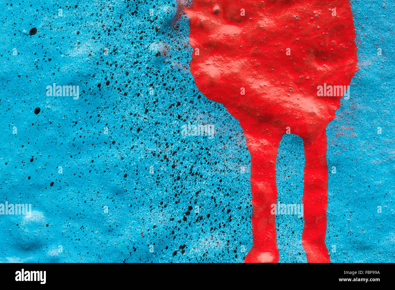 Macro close-up of colourful splash of spray paints. Stock Photo