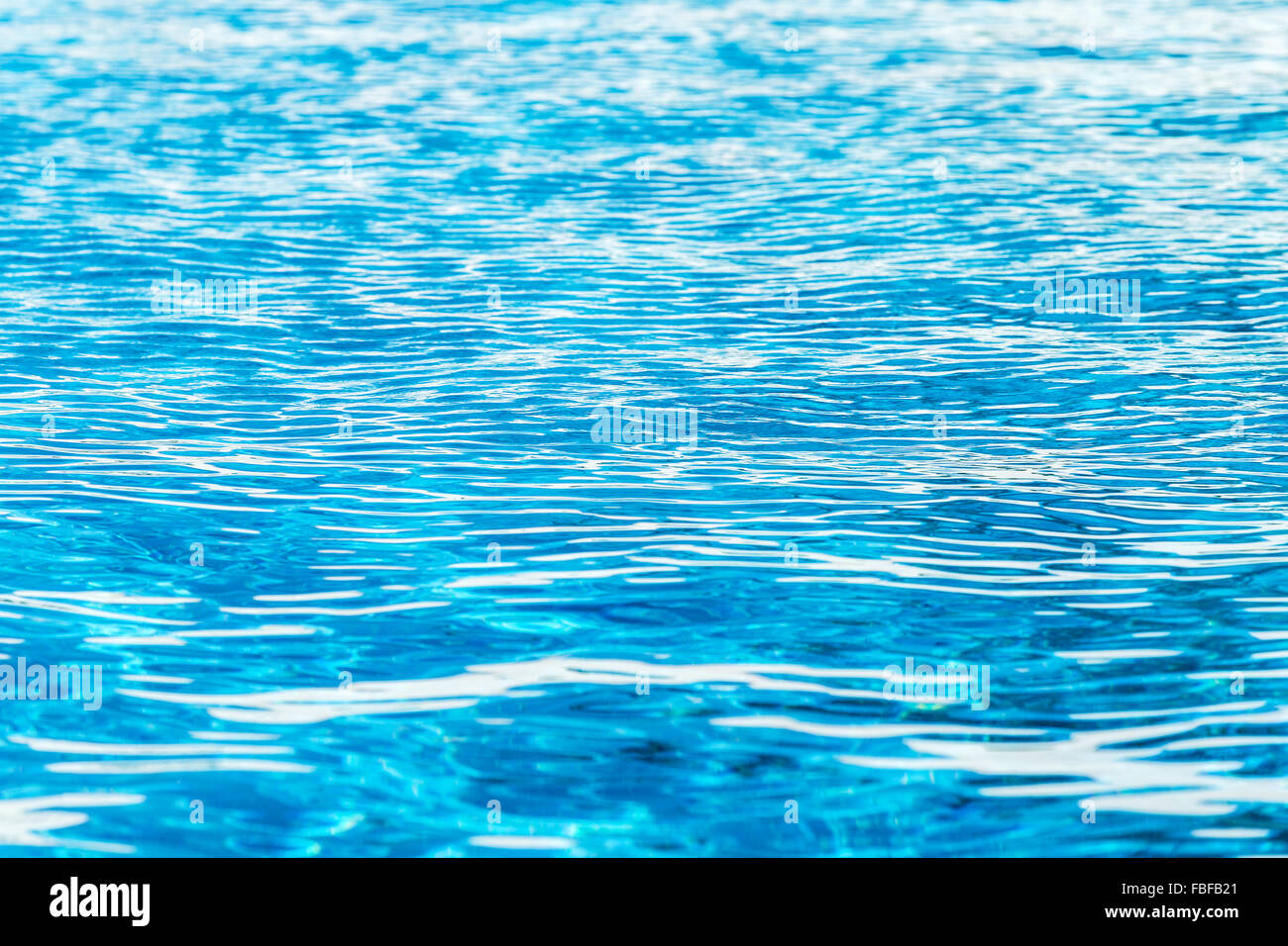 Ripples on the water in the swimming pool. Stock Photo