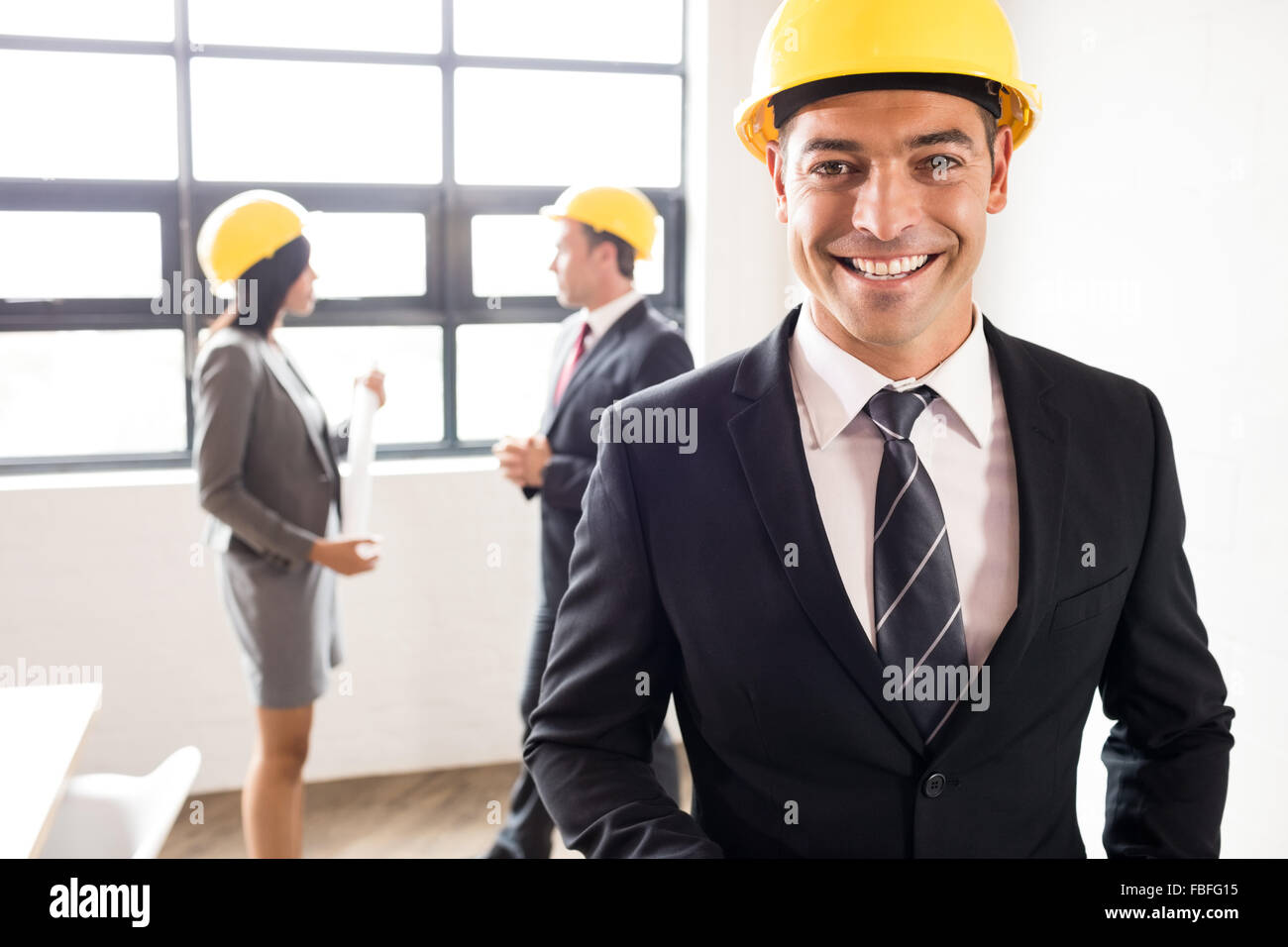 Wearing safety helmets hi-res stock photography and images - Alamy