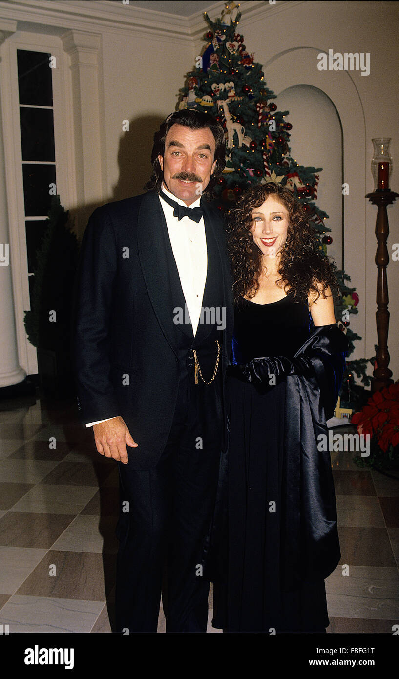Washington, DC., USA, 6th December, 1992 Tom Selleck and his wife Jilly arrive at the White House State Dinner for the Kennedy Center Honors.  Thomas William 'Tom' Selleck  is an American actor and film producer. He is best known for his starring role as the private investigator Thomas Magnum in the television series Magnum, P.I. (1980 to 1988), based in Hawaii. He also plays Police Chief Jesse Stone in a series of made-for-TV movies based on Robert B. Parker novels. Since 2010, he has appeared as NYPD Police Commissioner Frank Reagan in the drama Blue Bloods on CBS-TV. Credit: Mark Reinstein Stock Photo