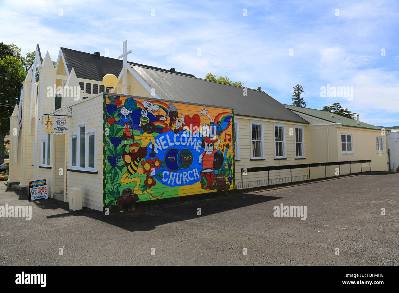 Colourful mural welcomes visitors to Paeroa Co-Operating Church, Paeroa, Waikato, New Zealand. Stock Photo