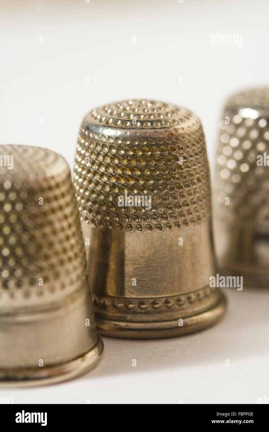 Three antique thimbles Stock Photo Alamy