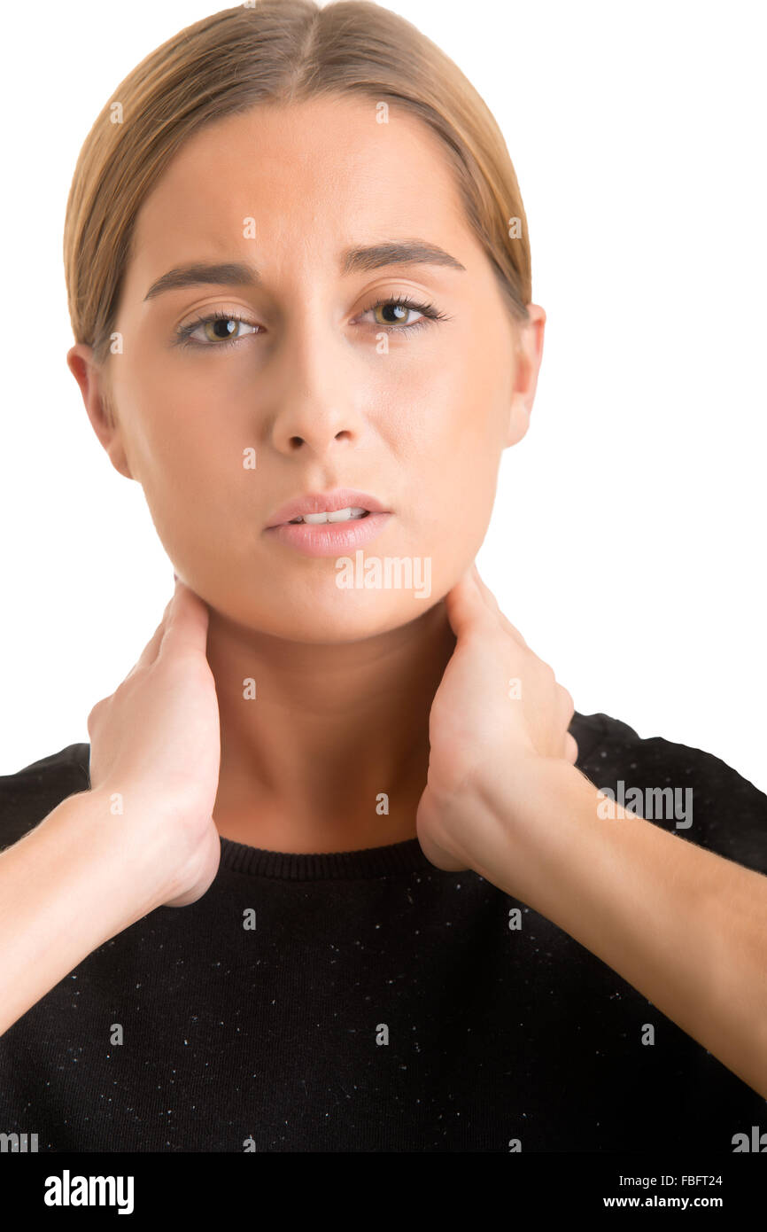 Woman with a sore throat holding her neck Stock Photo Alamy