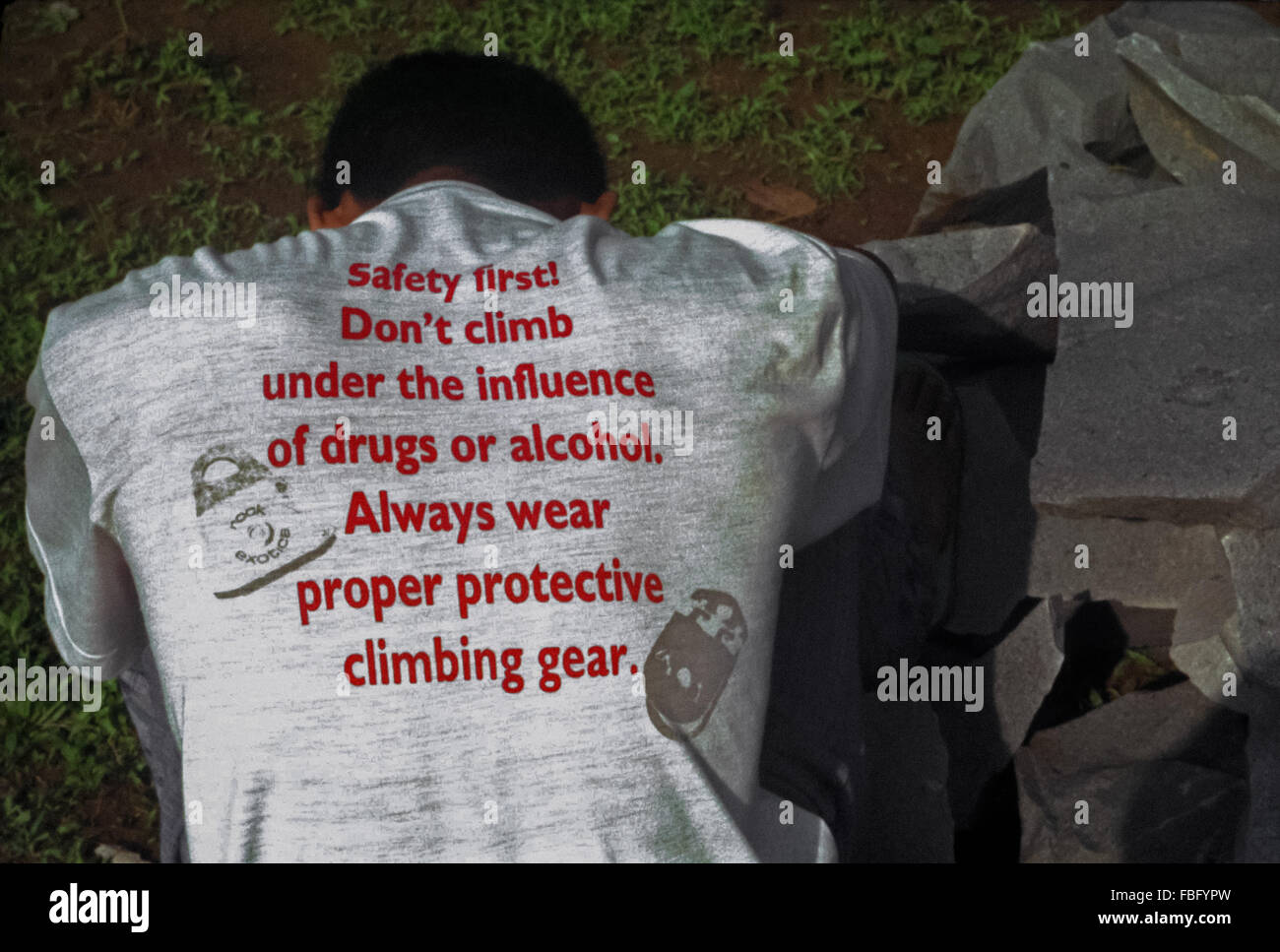 Tshirt with safety precautions on rock climbing activity Stock Photo