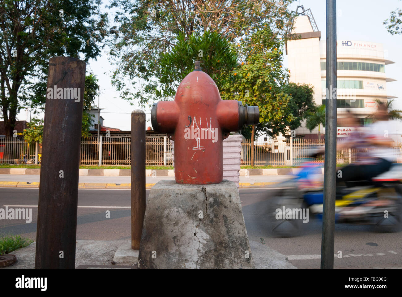 A roadside fire hydrant in Kelapa Dua, Kebon Jeruk, West Jakarta, Jakarta, Indonesia. Stock Photo