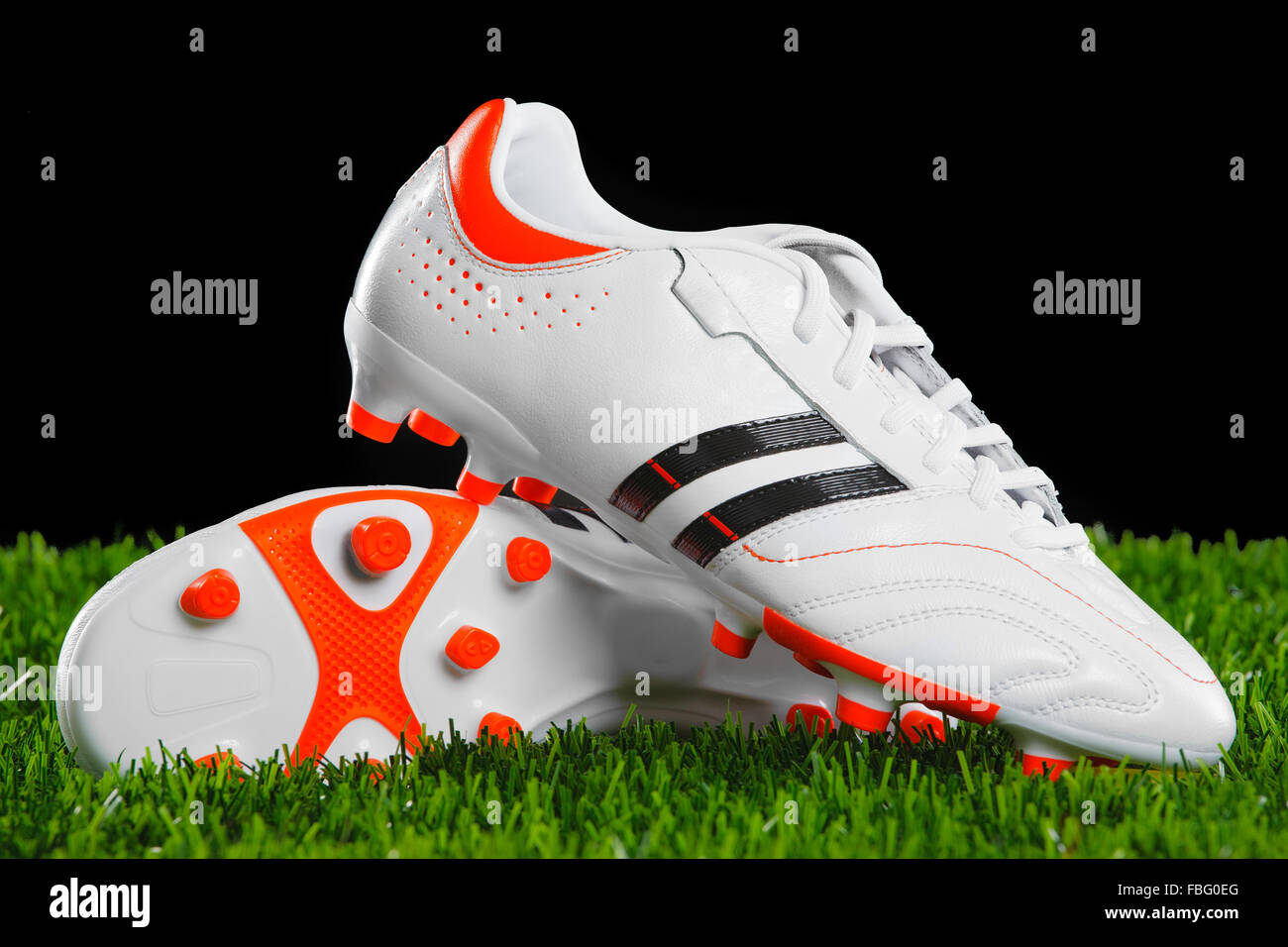 indoor soccer shoes on grass
