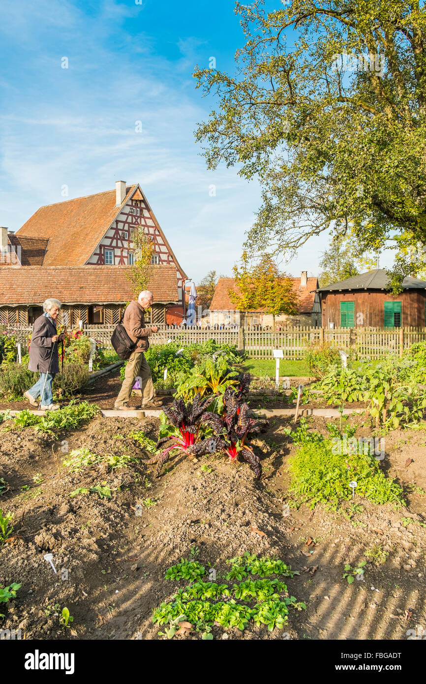 visitors in the farm vegetable garden, open-air museum, wackershofen, schwaebisch hall, baden-wuerttemberg, germany Stock Photo