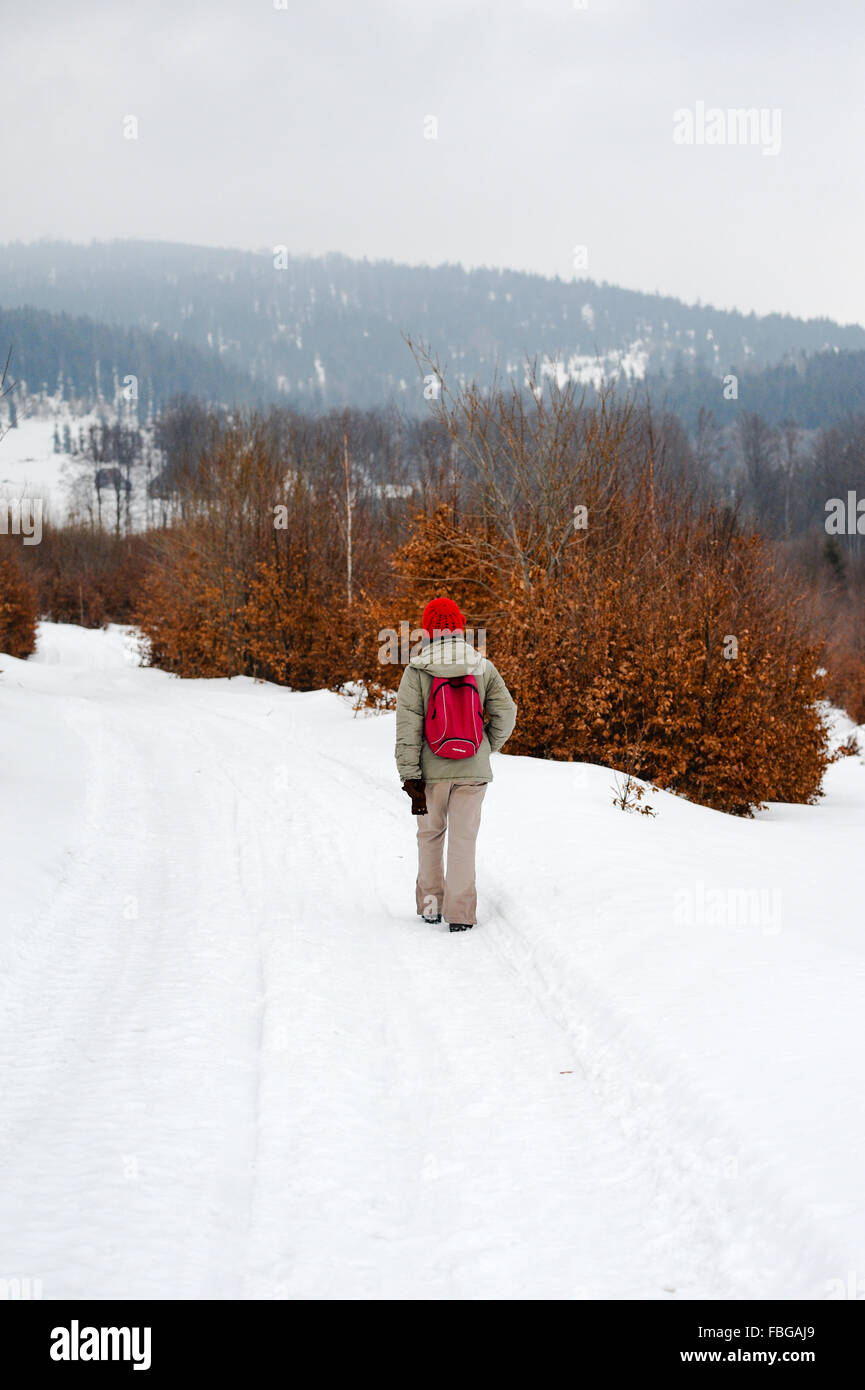 Girl walking alone in forest hi-res stock photography and images - Alamy