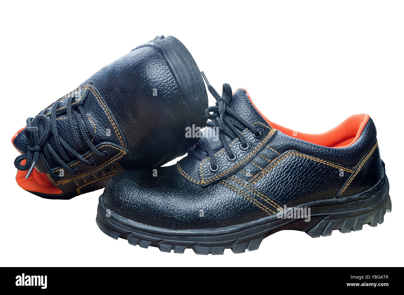 Black steel toe safety of steel cap work boots on white blackground. Stock Photo