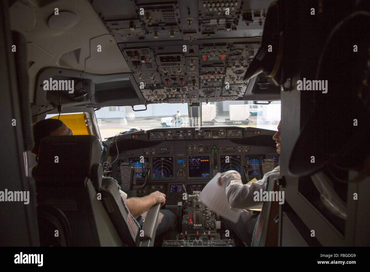 Pilots in cockpit Oman Airways plane, Bandaranayake International Airport, Colombo, Sri Lanka, Asia Stock Photo