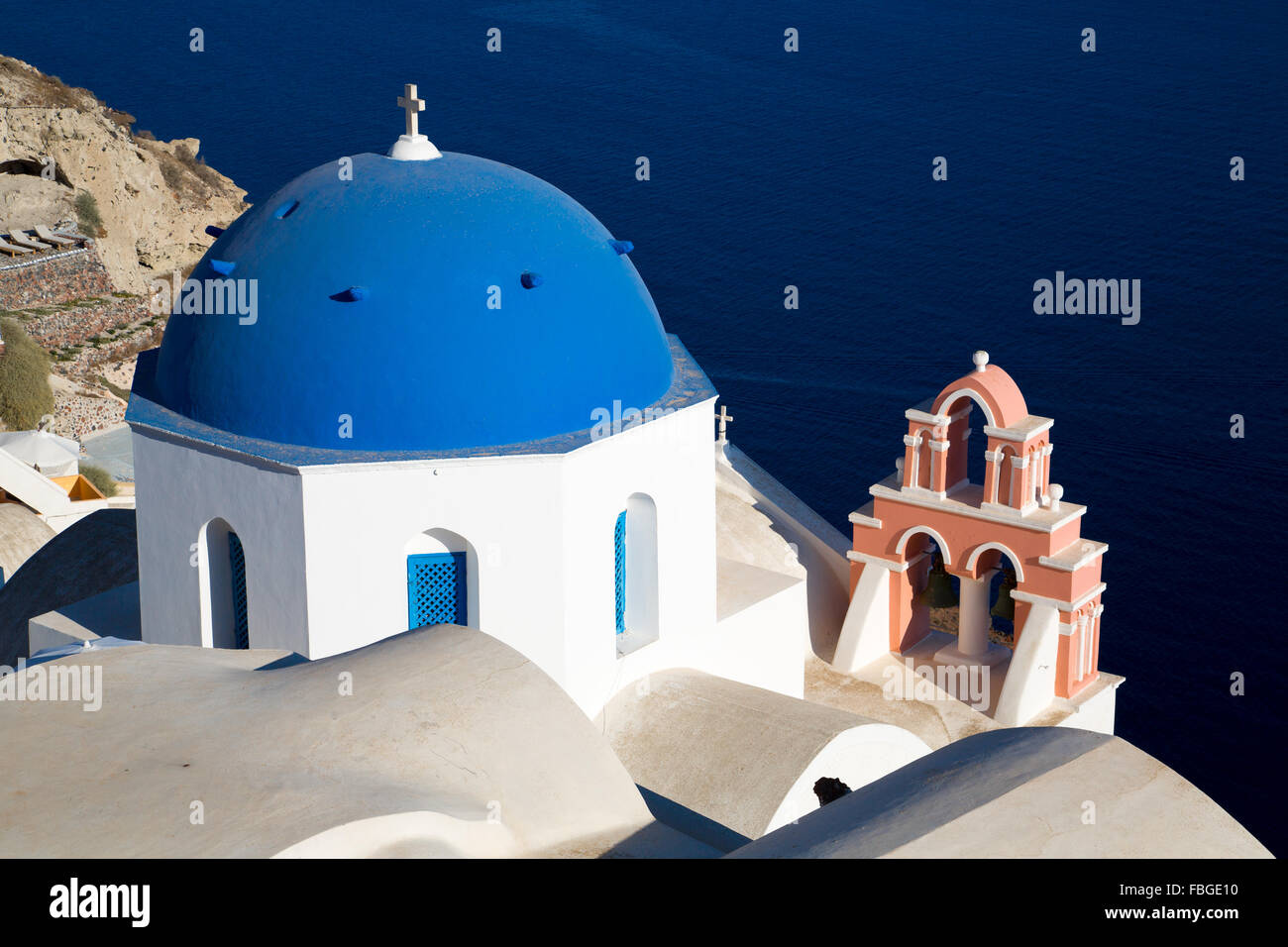 Blue domes and their bell tower in Oia. Santorini Stock Photo - Alamy