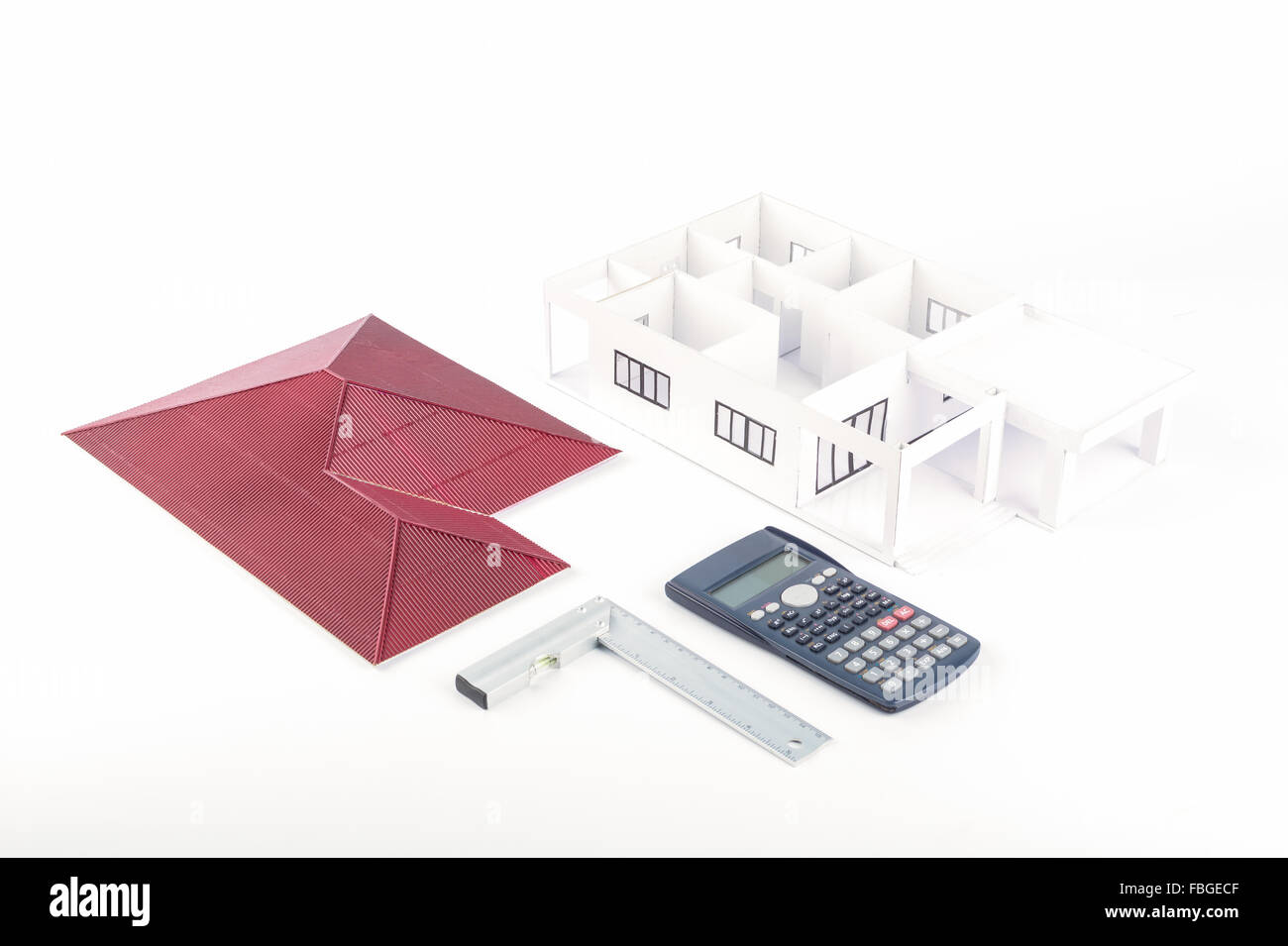 Model of the house and  calculator, pencil, Plastic right angle on white background Stock Photo