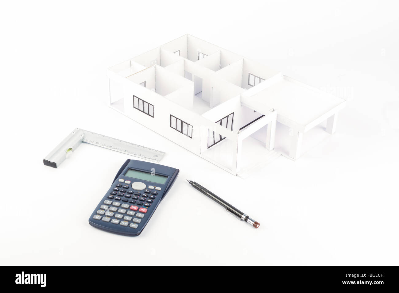 Model of the house and  calculator, pencil, Plastic right angle on white background Stock Photo