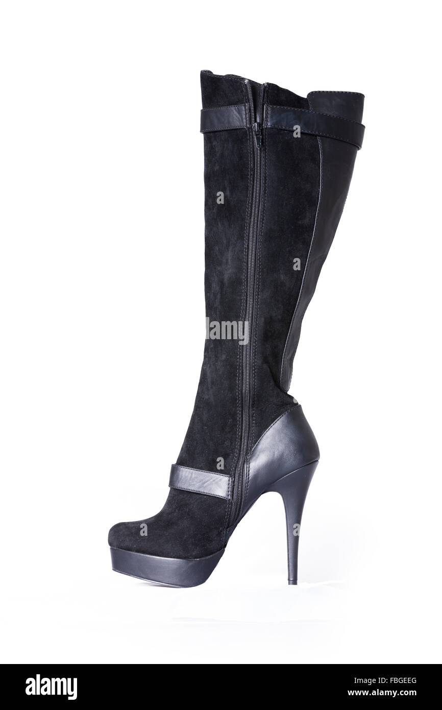 Suede and leather womens black knee length  stiletto boots. Stock Photo