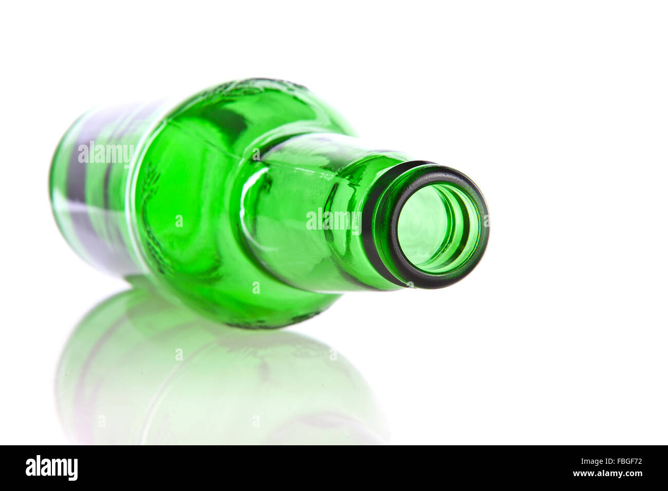Green glass bottle isolated on a white background Stock Photo - Alamy