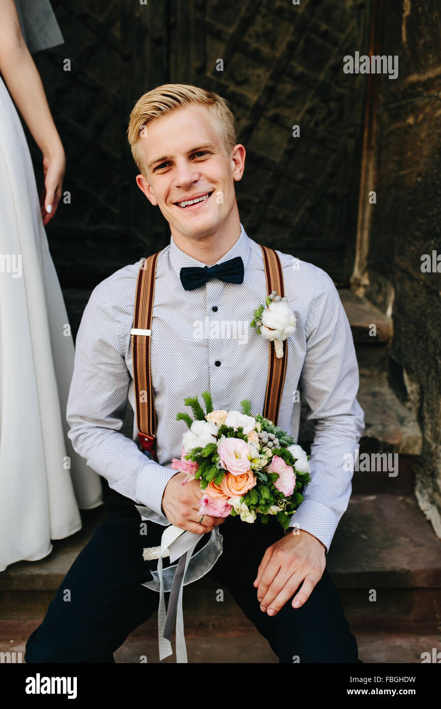 bride sitting on stone steps Stock Photo - Alamy