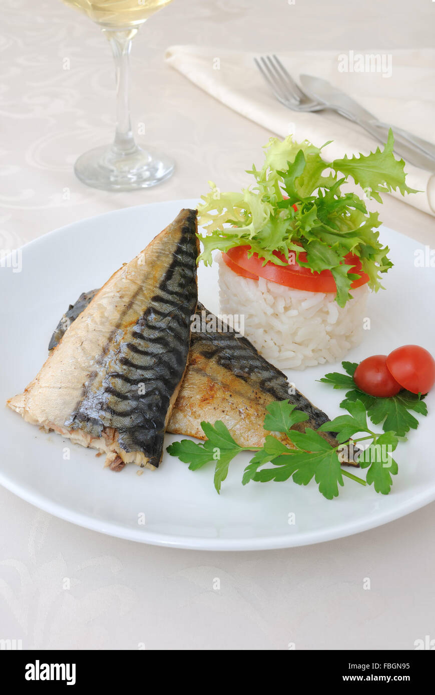 Baked mackerel with rice under vegetables Stock Photo Alamy