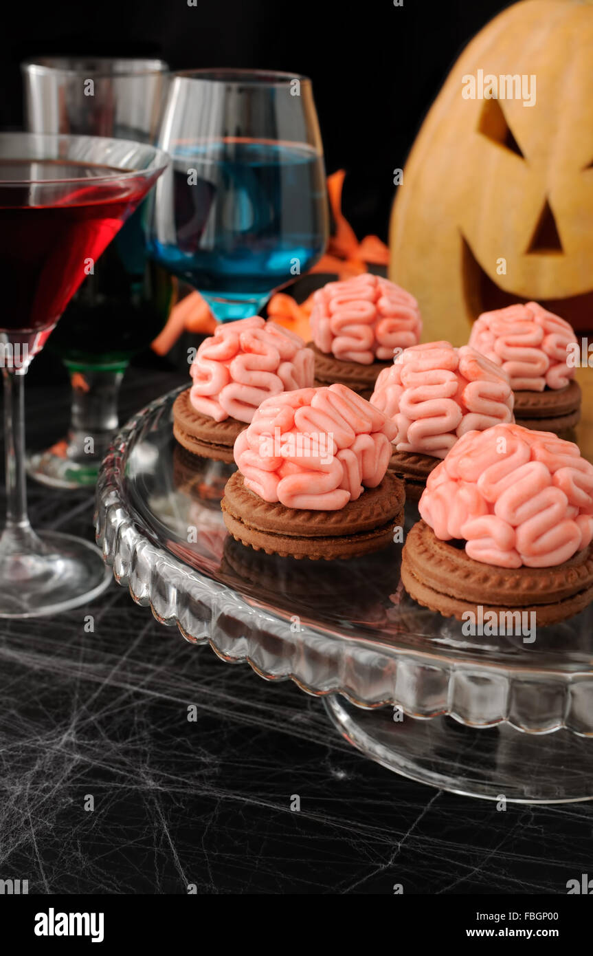 Funny cookie with brains of marzipan on Halloween Stock Photo