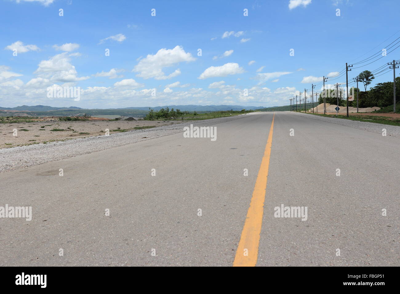 asphalt road against a blue sky Stock Photo