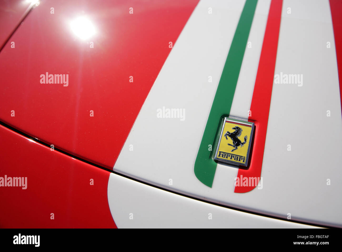 Front of Ferrari 360 with stripes in the Italian national colours. Stock Photo