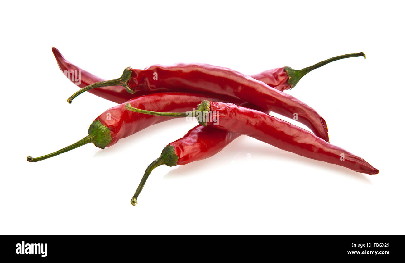 Red chili peppers isolated against a white background Stock Photo - Alamy