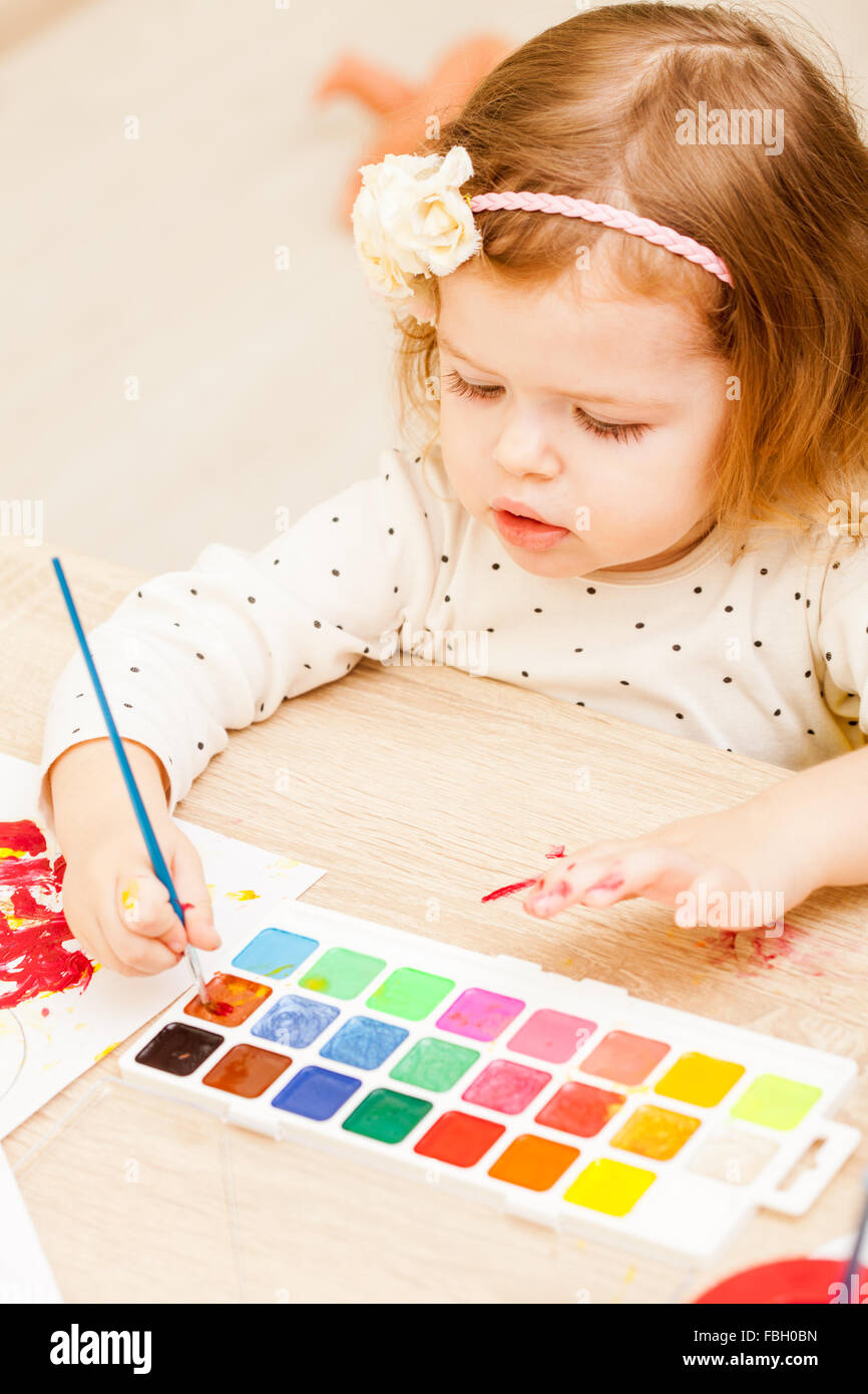 Girl is painting Stock Photo Alamy