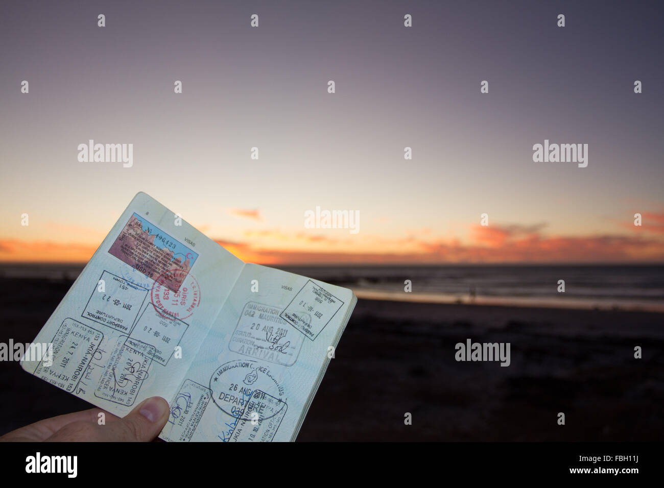 Passport with visas and border control stamps. Stock Photo