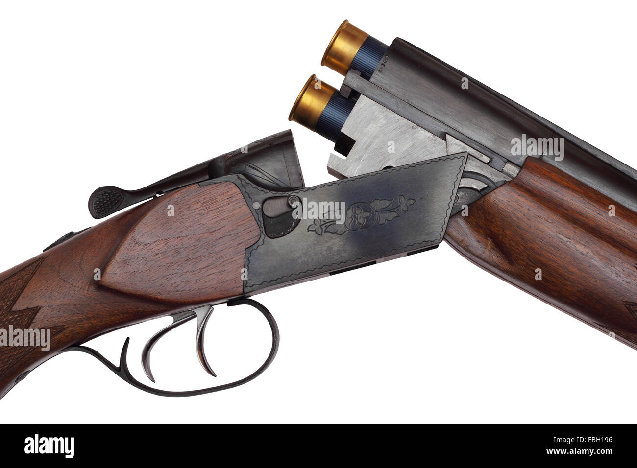 Opened doublebarrelled hunting gun with two blue cartridges closeup