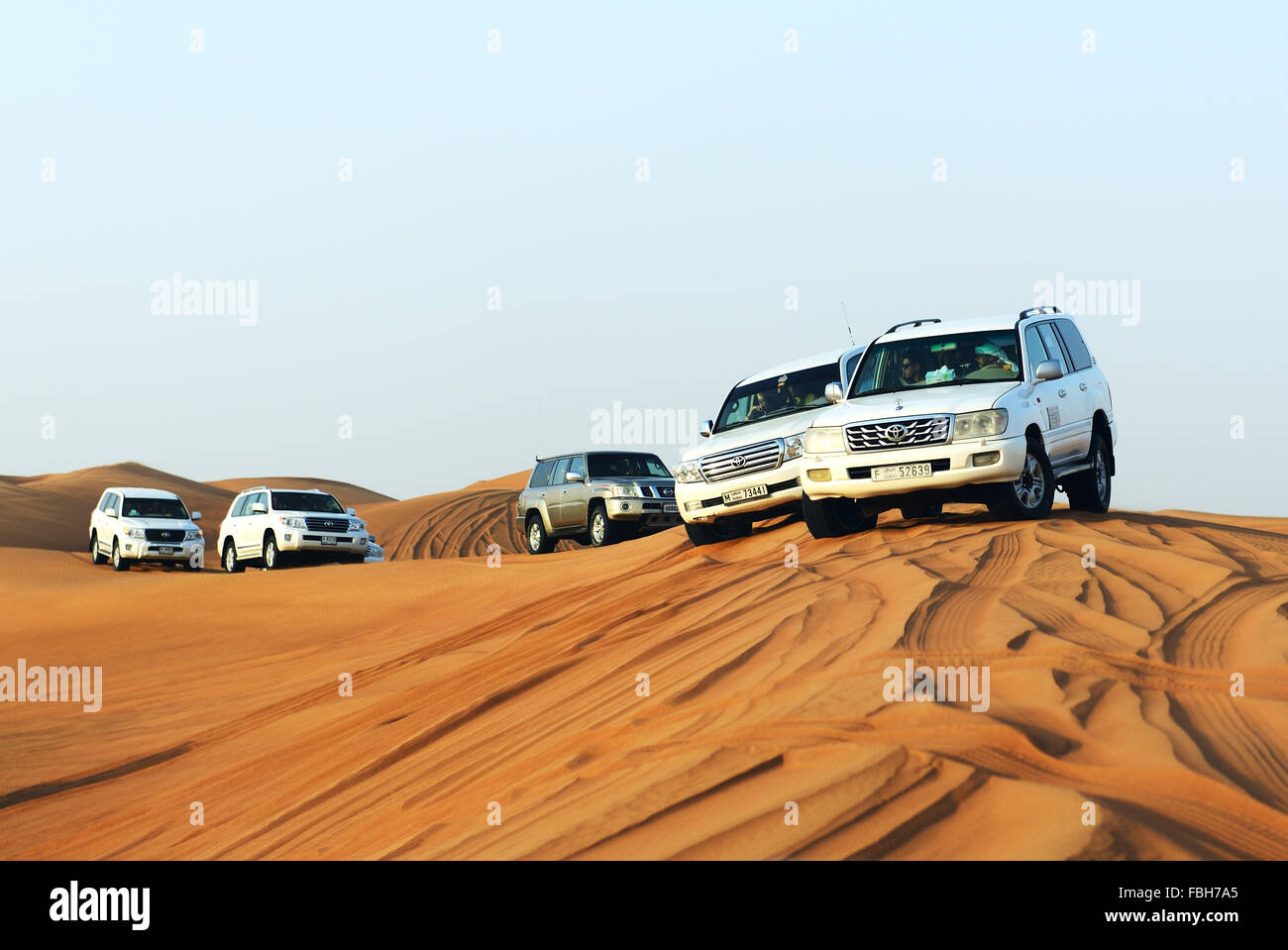 The Dubai desert trip in off-road car is major tourists attraction in Dubai Stock Photo