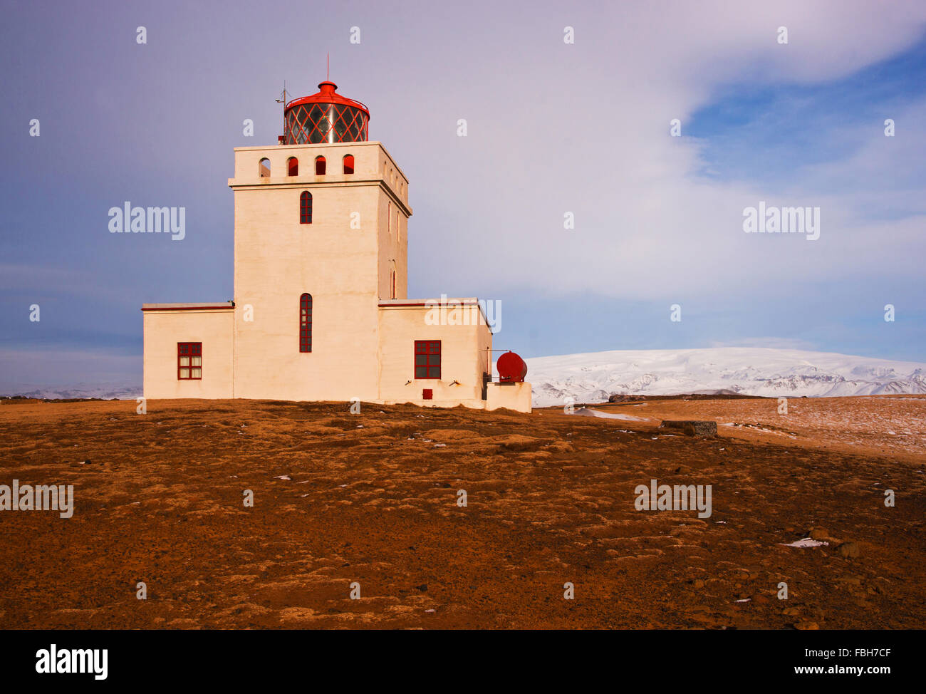 Lighthouse at the cape Dyrhólaey (door hole island), the southermost place of Iceland Stock Photo