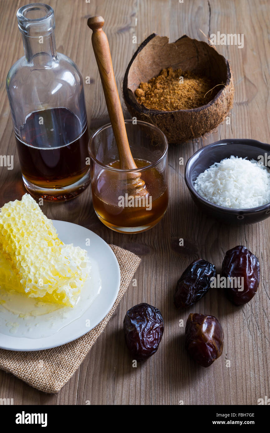 Sweetener ingredients including honey sugar and maple syrup Stock Photo