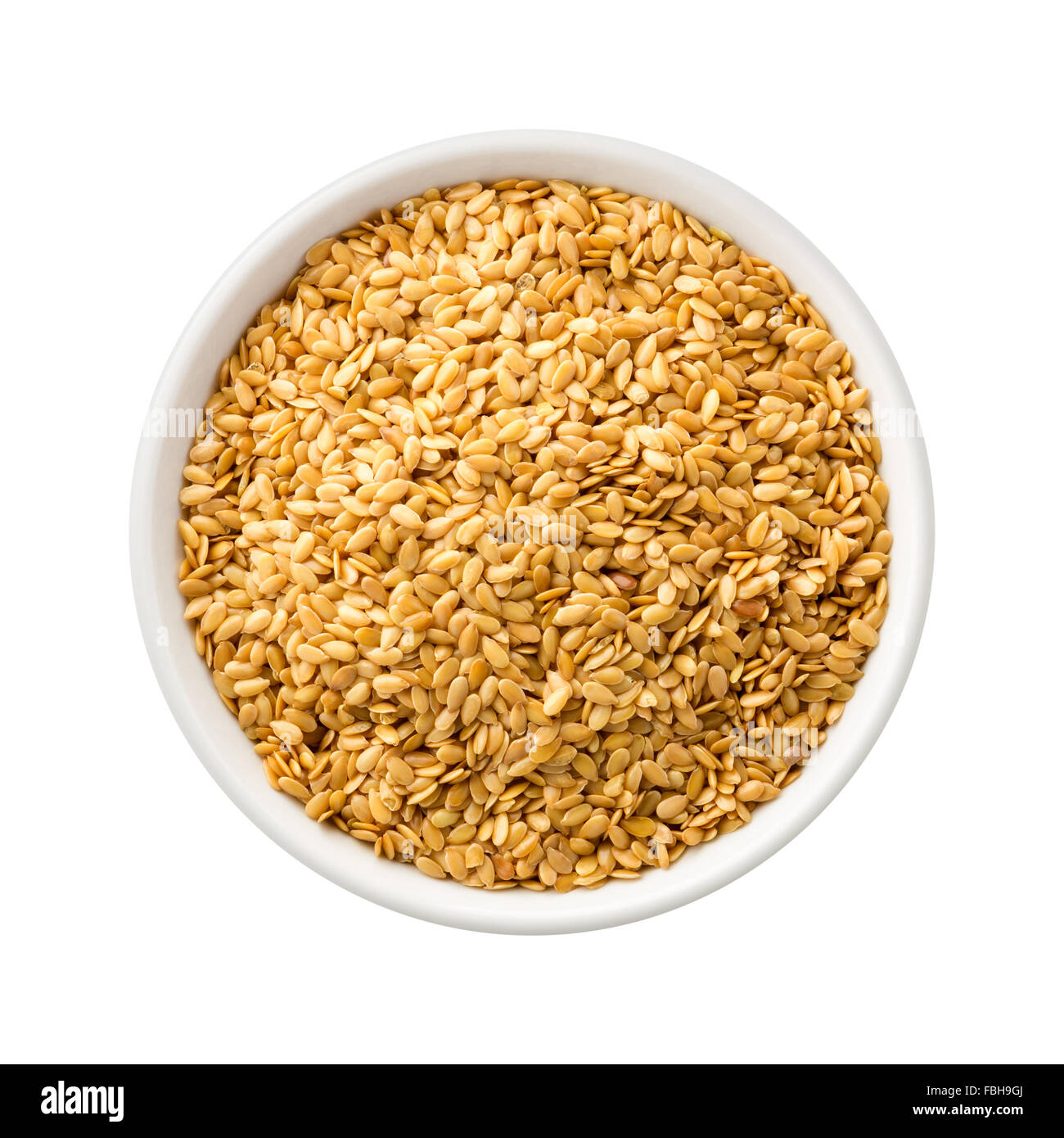 Golden Flax Seed in a Ceramic Bowl Stock Photo