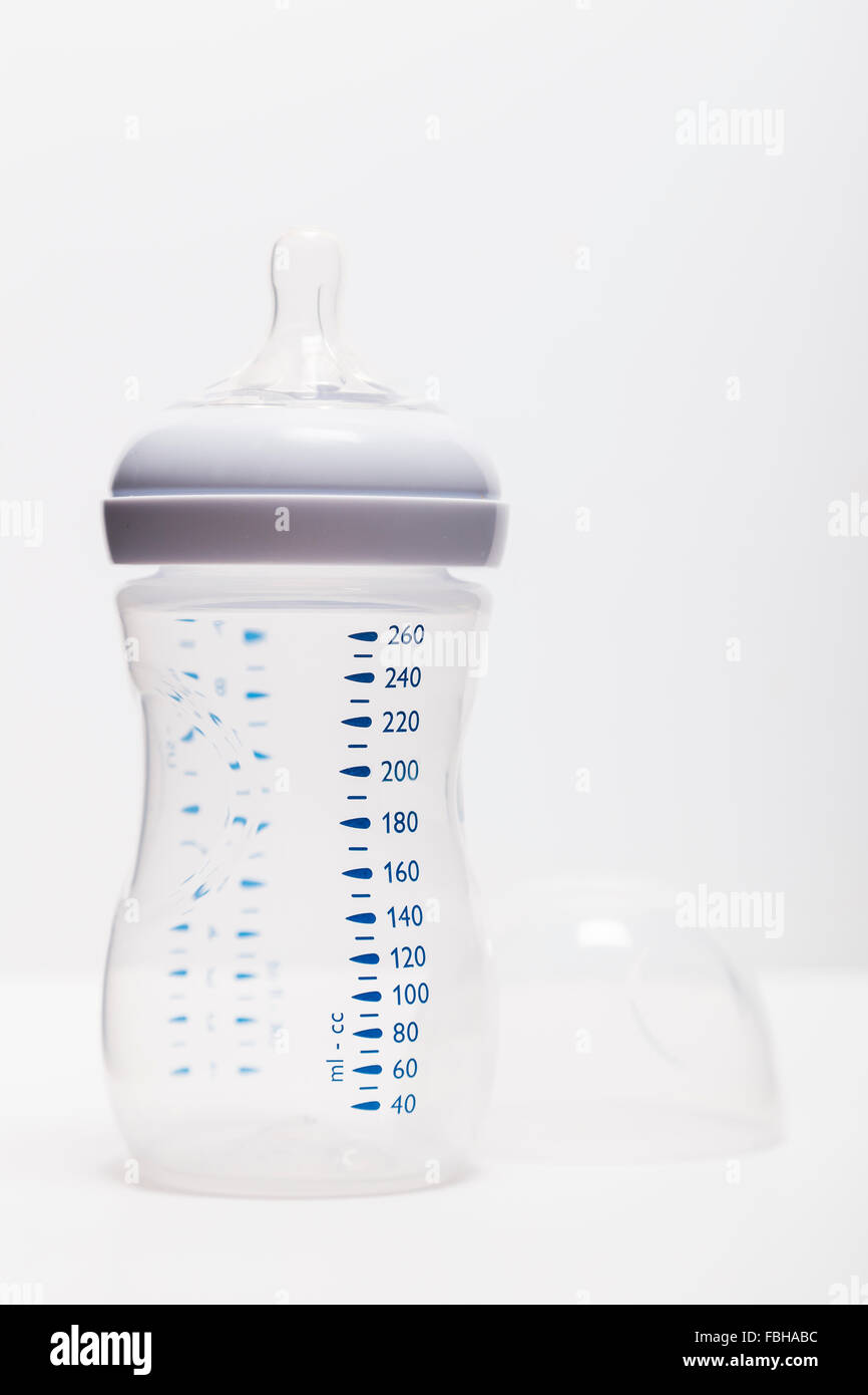 Baby milk bottle with lid removed Stock Photo Alamy