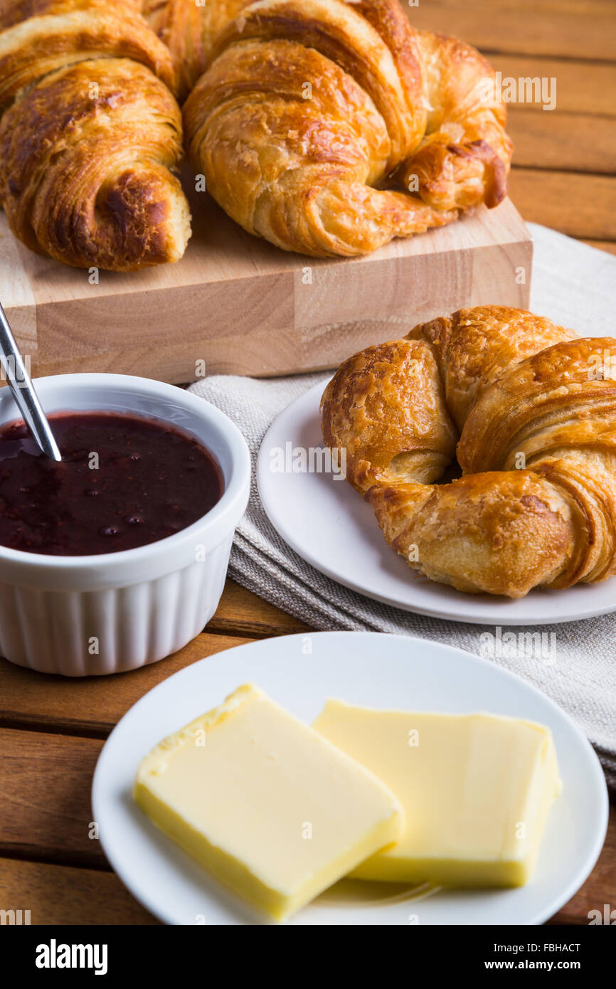 Croissants with butter and jam pot Stock Photo