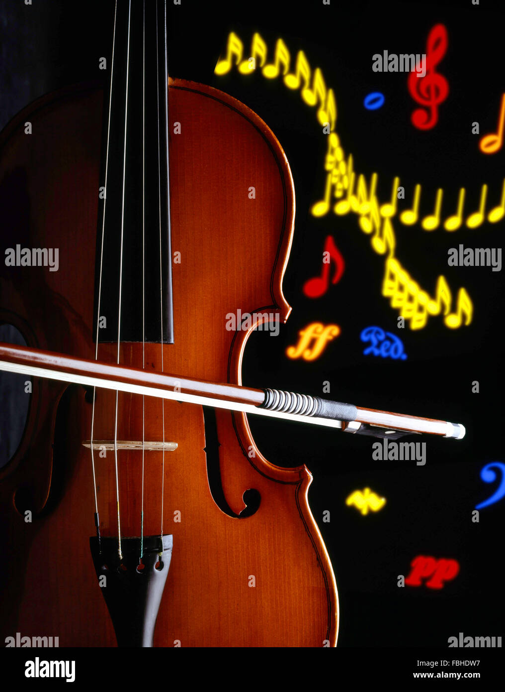 Still-life of violin and bow with musical notes in background, London, England, United Kingdom Stock Photo