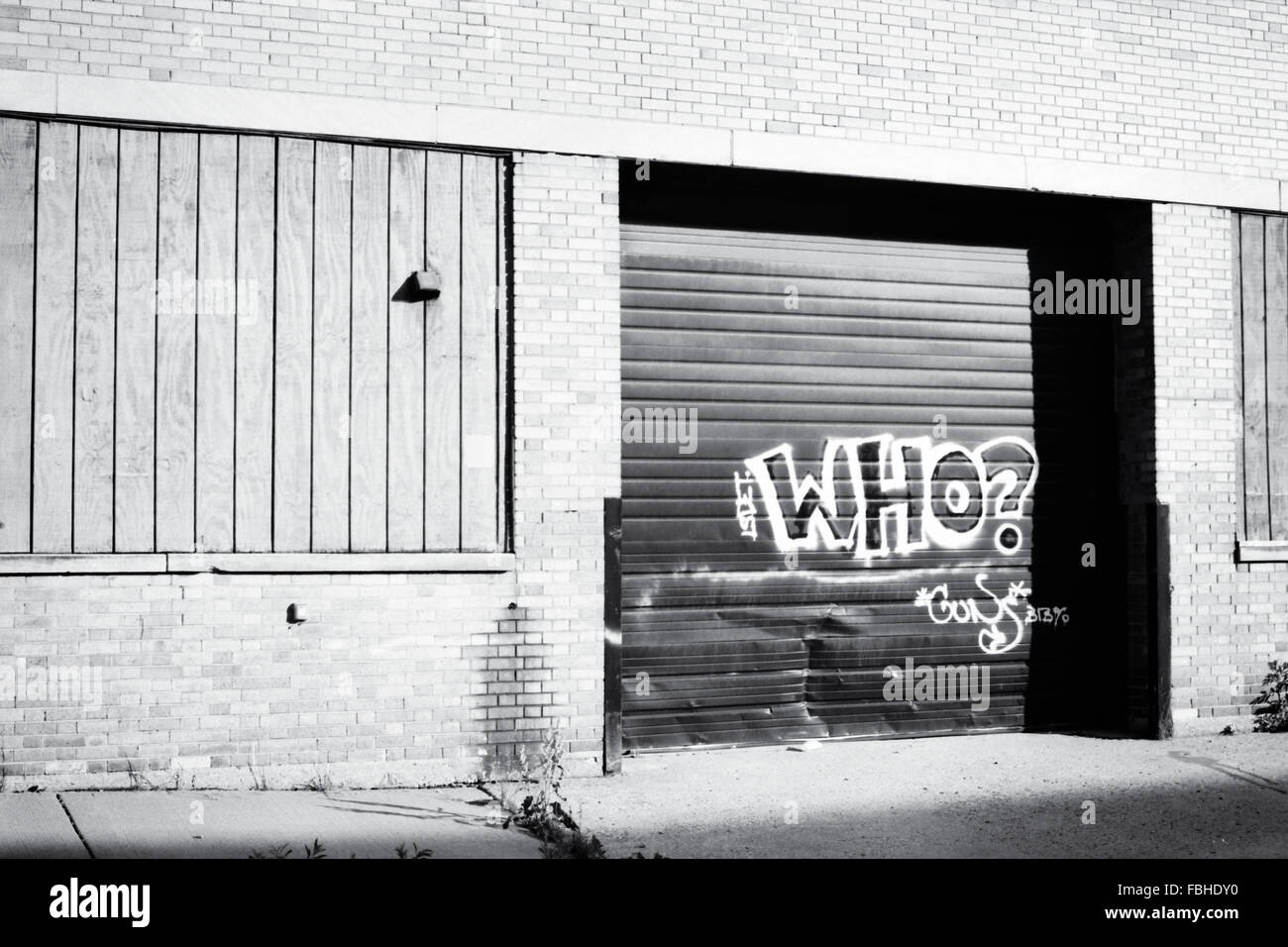 Graffiti on factory delivery door in Detroit Stock Photo