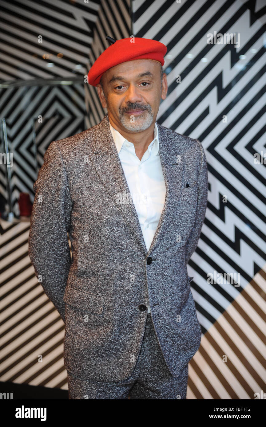 affældige gammelklog over Shoe Designer Christian Louboutin launches new boutique selling his  trademark red-soled shoes inside Selfridges,Manchester Stock Photo - Alamy