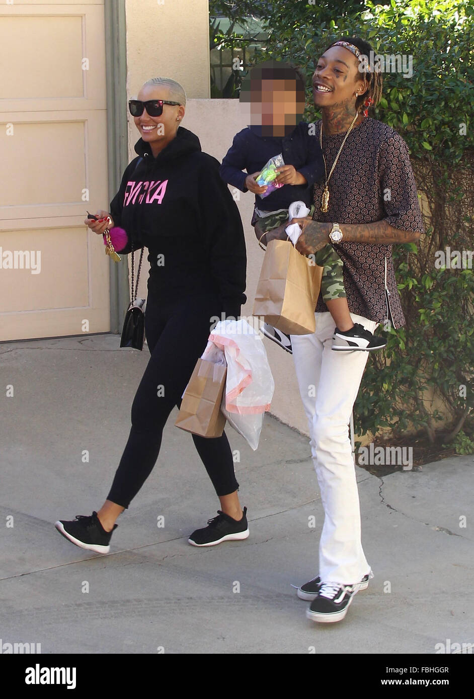 Amber Rose dressed in a FVCKA jogging suit, takes her son to the park with  husband Wiz Khalifa Featuring: Amber Rose, Sebastian Taylor Thomaz, Wiz  Khalifa Where: Los Angeles, United States When: