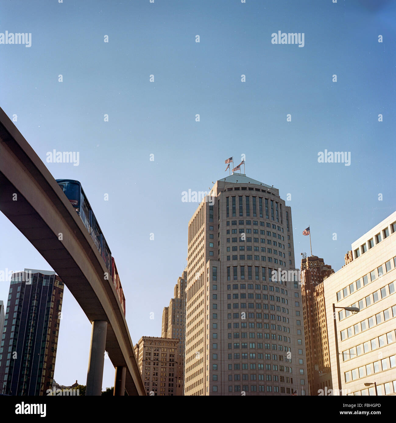 People Mover speeds by with Detroit architecture in the background Stock Photo