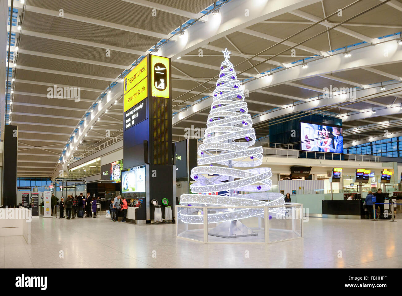 Christmas tree at Departures level, Terminal 5, Heathrow Airport. Hounslow, Greater London, England, United Kingdom Stock Photo