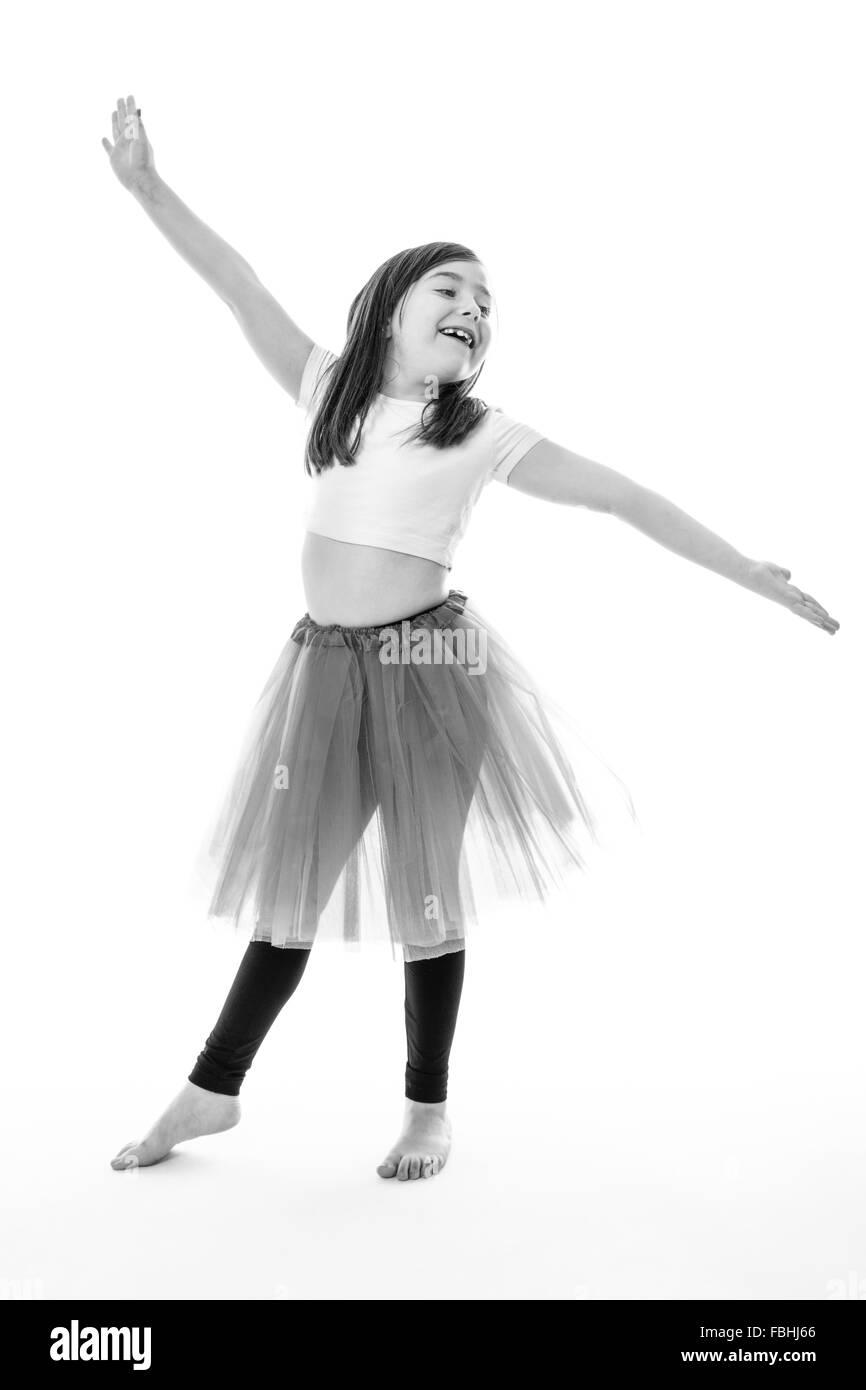 Pretty young girl posing in a bright pink tutu Stock Photo