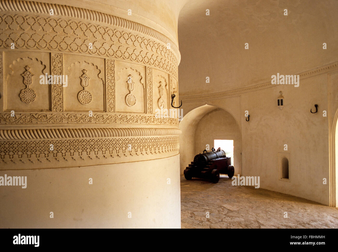 Hazm, Oman.  Cannon Guarding the Approaches from inside the Fort. Stock Photo